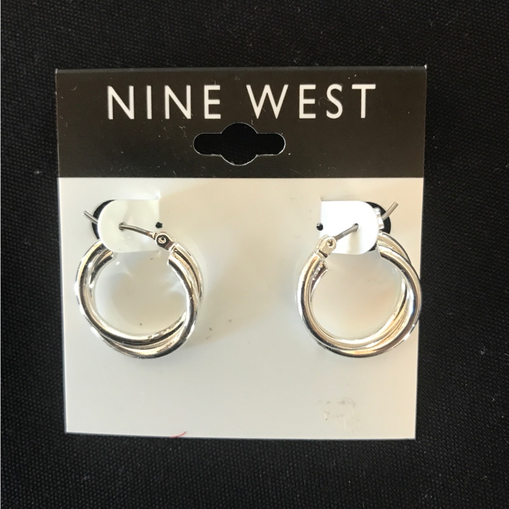 NWT Nine West silver double spiral loop earrings.